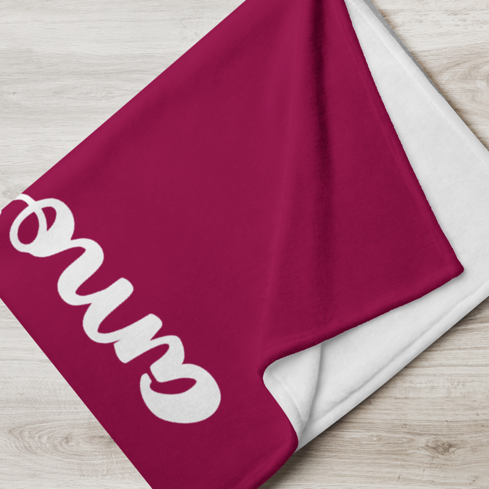 Kuscheldecke mit weißem „amore“-Schriftzug, gefaltet mit sichtbarer weißer Rückseite. Passione Italiano