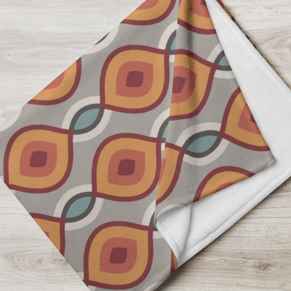 Wohntextil mit dekorativem Muster und funktionaler Eleganz – ideal für Sofa oder Bett