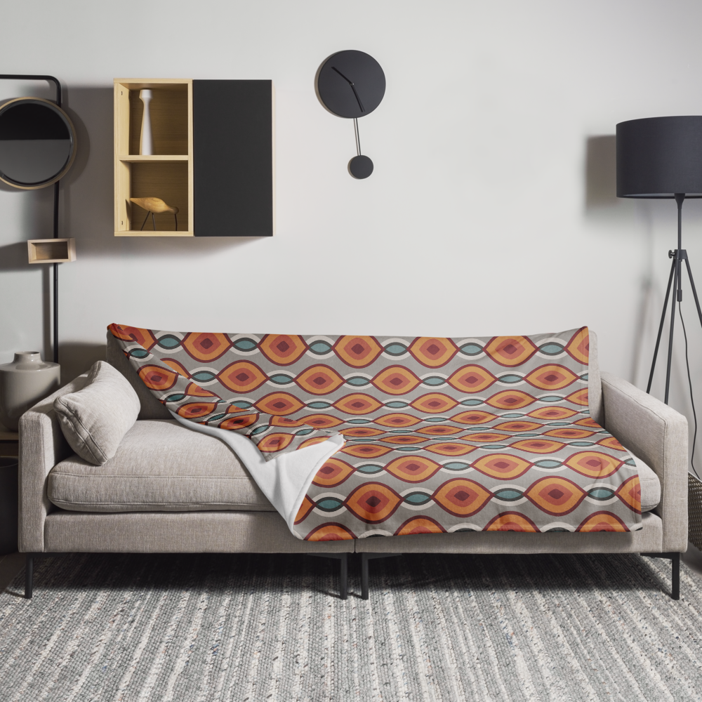 Tagesdecke mit geometrischem Muster in Rot, Orange, Blau auf grauem Hintergrund – mediterran & rhythmisch

Seidenweiche Decke mit folkloristisch inspiriertem Print und weißer Rückseit