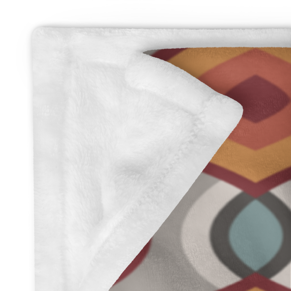 Seidenweiche Decke mit folkloristisch inspiriertem Print und weißer Rückseite